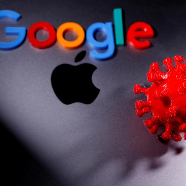 FILE PHOTO: 3D printed coronavirus model and Google logo