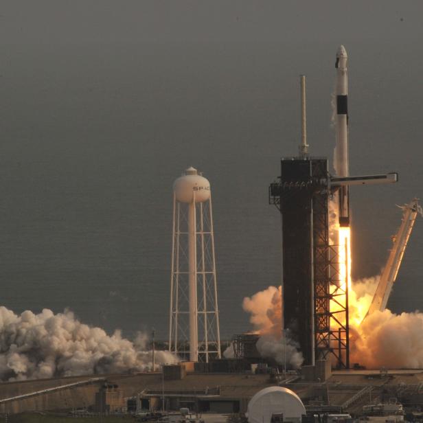 A SpaceX Falcon 9 rocket, carrying the Crew Dragon astronaut capsule, lifts off on an in-flight abort test from the Kennedy Space Center in Cape Canaveral