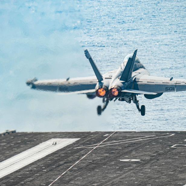 An F/A-18E Super Hornet launches from the flight deck of the U.S. Navy aircraft carrier USS Harry S. Truman in the Arabian Sea