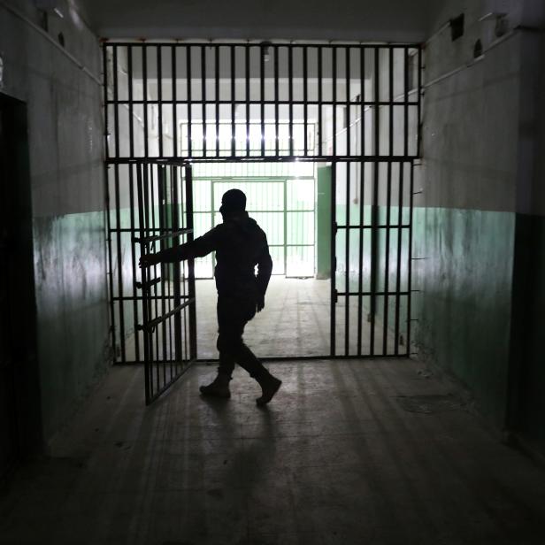 The Wider Image: Inside the prisons where remnants of Islamic State are held in limbo