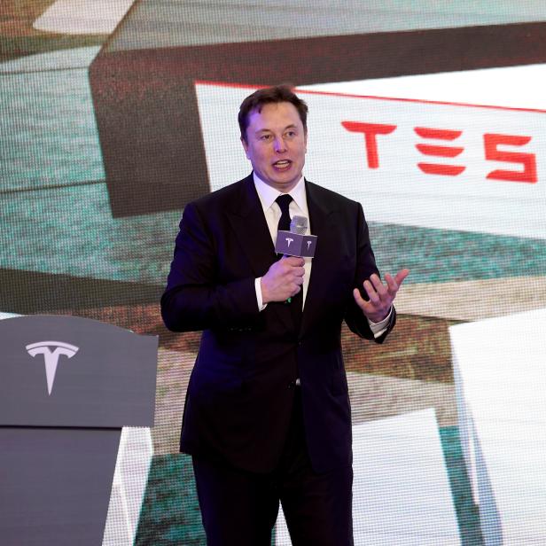 FILE PHOTO: Tesla Inc CEO Elon Musk speaks at an opening ceremony for Tesla China-made Model Y program in Shanghai