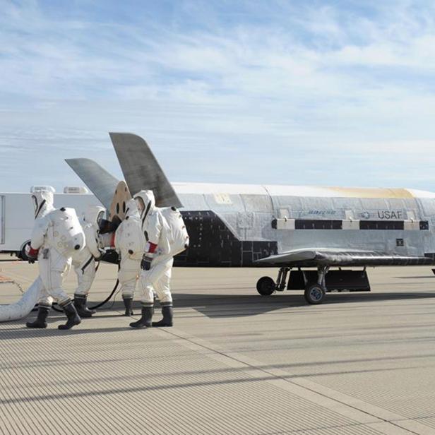 FILE PHOTO: The X-37B Orbital Test Vehicle mission 3 space plane is shown after landing at Vandenberg Air Force Base, California