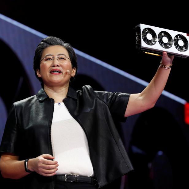 Lisa Su, president and CEO of AMD, holds up the Radeon VII, a 7nm gaming graphics card during a keynote address at the 2019 CES in Las Vegas