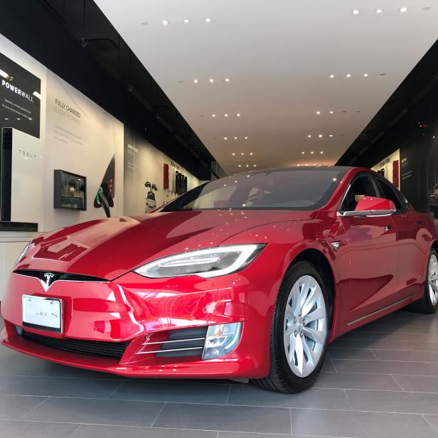 FILE PHOTO: FILE PHOTO: FILE PHOTO: A Tesla Model S car is seen in a showroom in Santa Monica