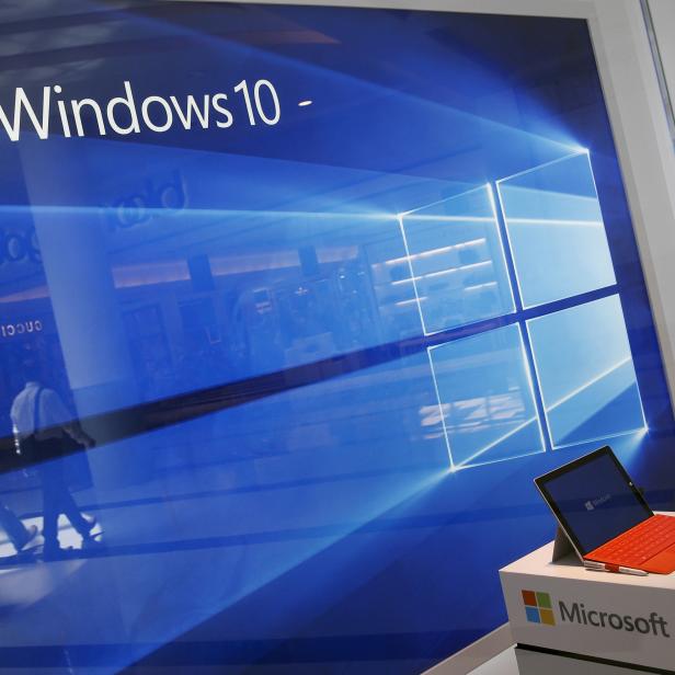 FILE PHOTO: A display for the Windows 10 operating system is seen in a store window of the Microsoft store at Roosevelt Field in Garden City
