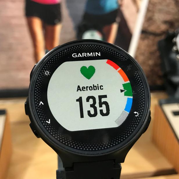 A Garmin GPS watch is shown on a display at a store in Encinitas