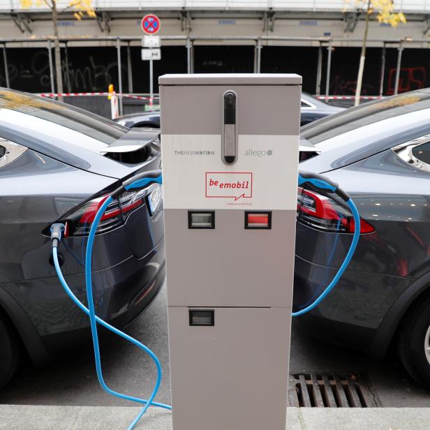 Tesla Model X electric cars recharge their batteries in Berlin