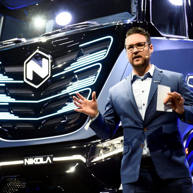 FILE PHOTO: CEO and founder of U.S. Nikola, Trevor Milton speaks during presentation of its new full-electric and hydrogen fuel-cell battery trucks in partnership with CNH Industrial, at an event in Turin