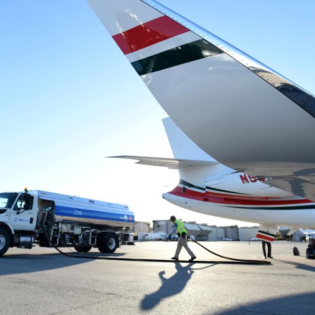 FILE PHOTO: A business jet is refuelled using Jet A fuel at the Henderson Executive Airport during the National Business Aviation Association (NBAA) exhibition in Las Vegas