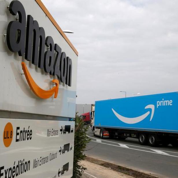 FILE PHOTO: A truck bearing the Amazon Prime logo arrives at the Amazon logistics center in Lauwin-Planque