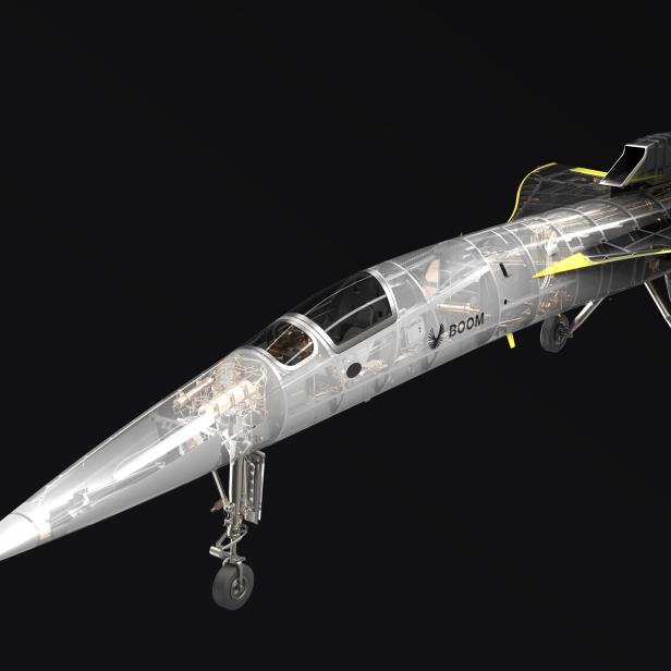 Ein transparentes Modell des Überschallflugzeugs Boom Overture auf schwarzem Hintergrund.