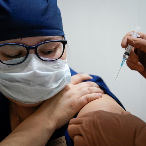 A medic of the regional hospital receives  Russia's "Sputnik-V" vaccine shot against the coronavirus disease (COVID-19) in Tver