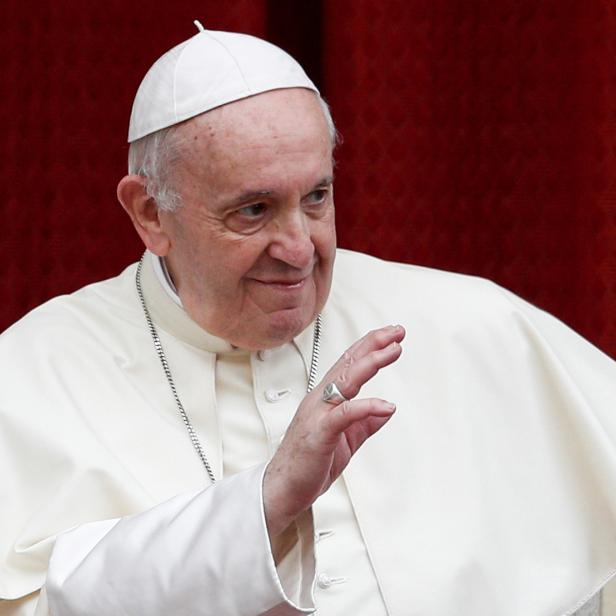 FILE PHOTO: Pope Francis arrives for the first weekly general audience to readmit the public since the coronavirus disease (COVID-19) outbreak, at the Vatican