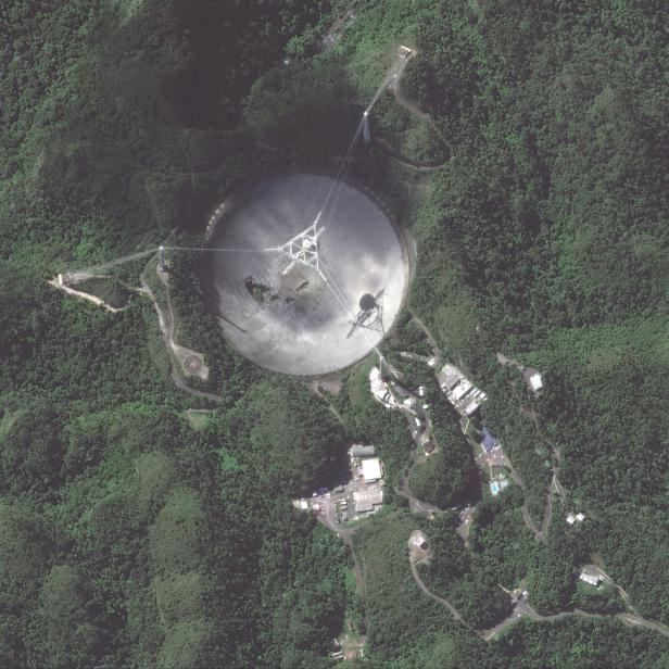 An overview of the damaged Arecibo Observatory radio telescope is seen in Arecibo, Puerto Rico