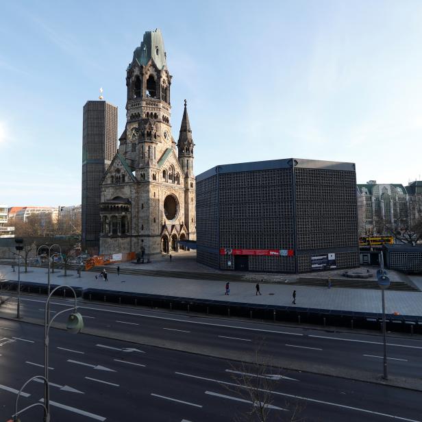 An empty street is seen next to Memorial Church during the spread of the coronavirus disease (COVID-19) in Berlin