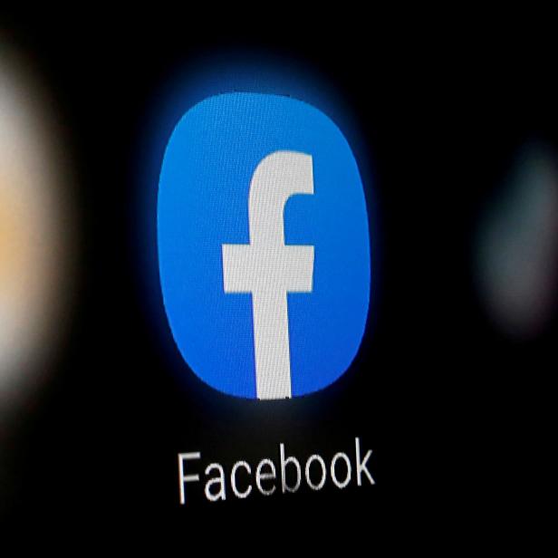 FILE PHOTO: FILE PHOTO: A Facebook logo is displayed on a smartphone in this illustration