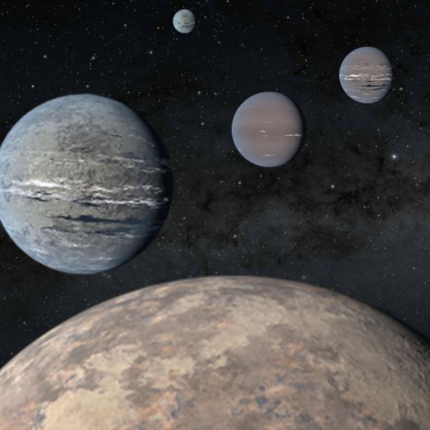 Mehrere Planeten sind vor einem Sternenhintergrund zu sehen.