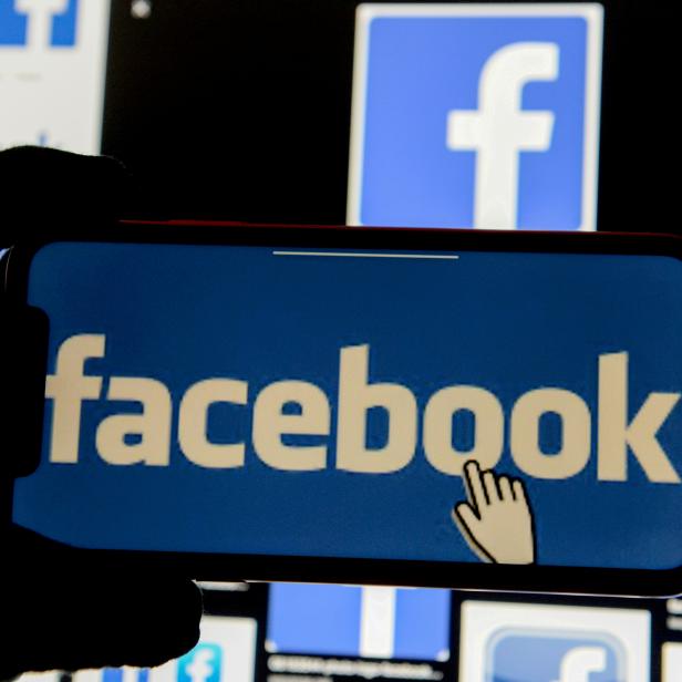 FILE PHOTO: FILE PHOTO: The Facebook logo is displayed on a mobile phone