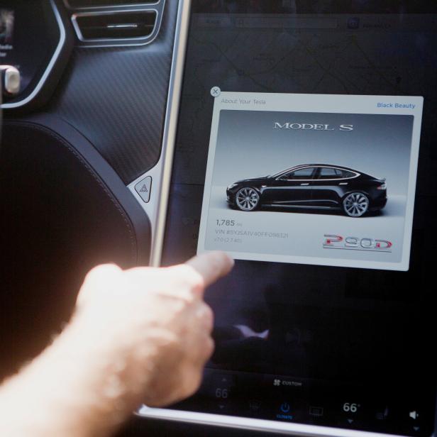 FILE PHOTO: The Tesla Model S version 7.0 software update containing Autopilot features is demonstrated during a Tesla event in Palo Alto