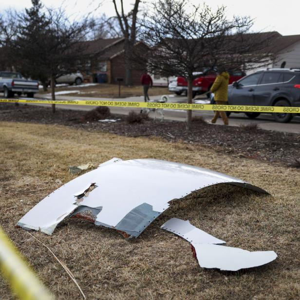 US-BOEING-777-DROPS-DEBRIS-ONTO-DENVER-NEIGHBORHOOD-AFTER-ENGINE