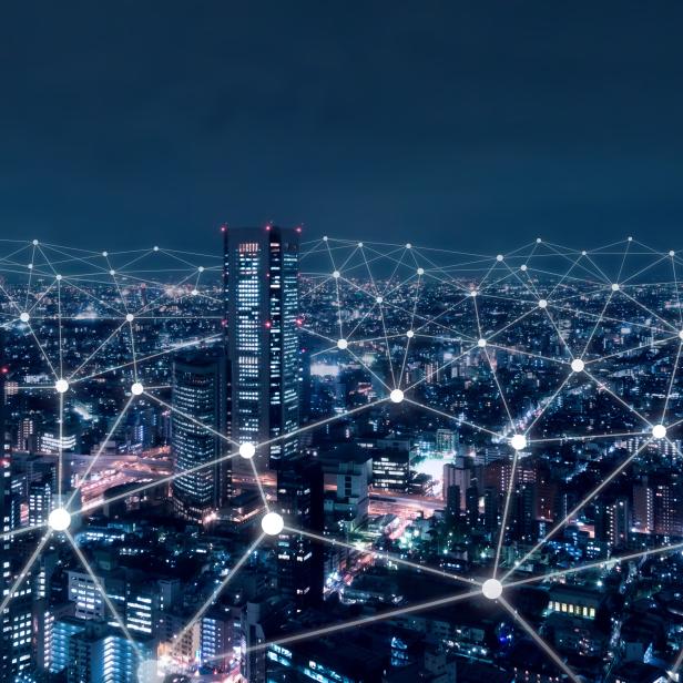 Telecommunication network above city, wireless mobile internet technology for smart grid or 5G LTE data connection, concept about IoT, global business, fintech, blockchain