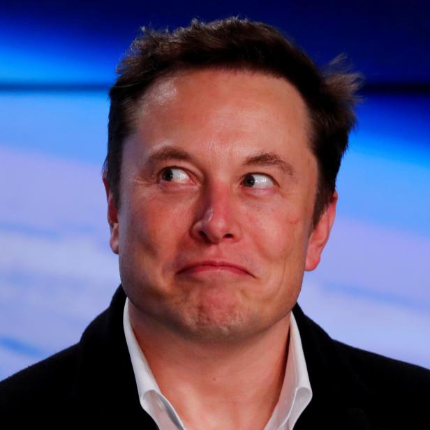 FILE PHOTO: SpaceX founder Musk reacts at a post-launch news conference in Cape Canaveral