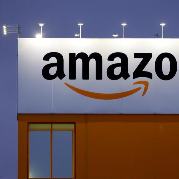 FILE PHOTO: The logo of Amazon is seen at the company logistics center in Lauwin-Planque, northern France