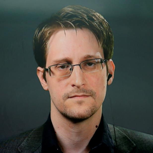 FILE PHOTO: Edward Snowden speaks via video link during a news conference in New York