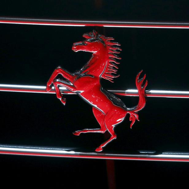 FILE PHOTO: Photo of a Ferrari logo seen on the grille of a Ferrari GTC4Lusso car at the 86th International Motor Show in Geneva