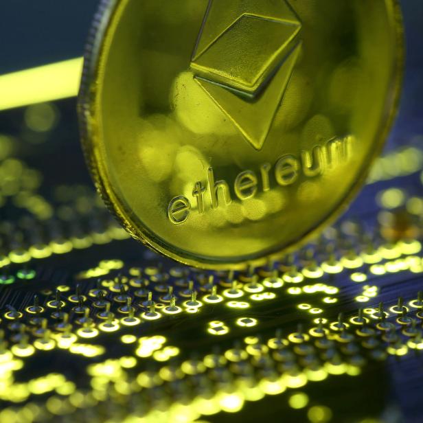 FILE PHOTO: Representation of the Ethereum virtual currency standing on the PC motherboard is seen in this illustration picture
