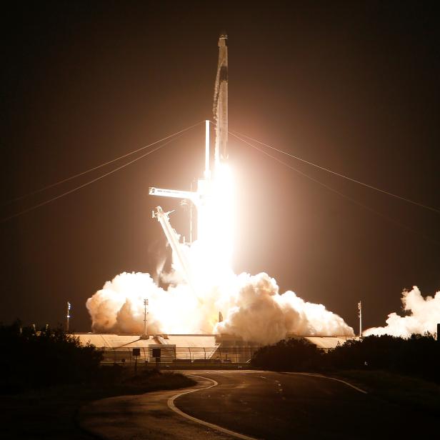 A SpaceX Falcon 9 rocket, with the Crew Dragon capsule, is launched carrying four astronauts on a NASA commercial crew mission to the International Space Station