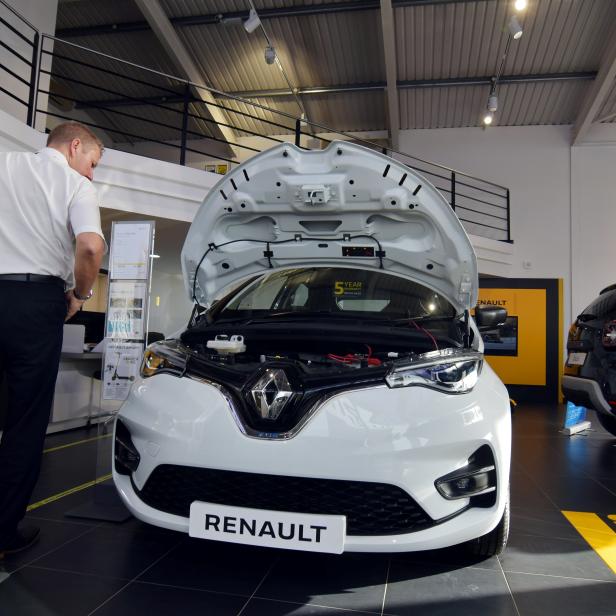 Steve Tomlin shows the new version of Renault's small battery electric Zoe model car in Reading