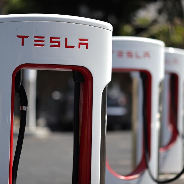 FILE PHOTO: A Tesla SuperCharger station is seen in Los Angeles