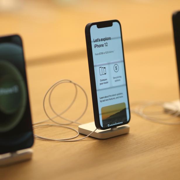 IPhone 12 phones are seen at the new Apple Store on Broadway in downtown Los Angeles