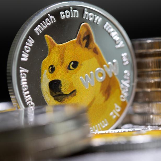 Representations of the virtual currency Dogecoin are seen in this illustration taken