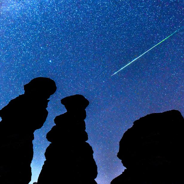 Perseid meteor shower over the stone dools in Kuklice