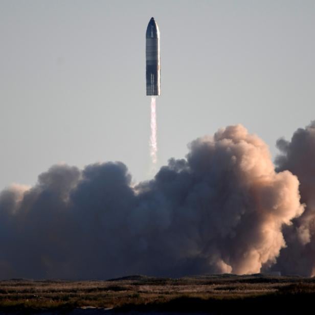 FILE PHOTO: SpaceX launches its first super heavy-lift Starship SN8 rocket during a test from their facility in Boca Chica,Texas