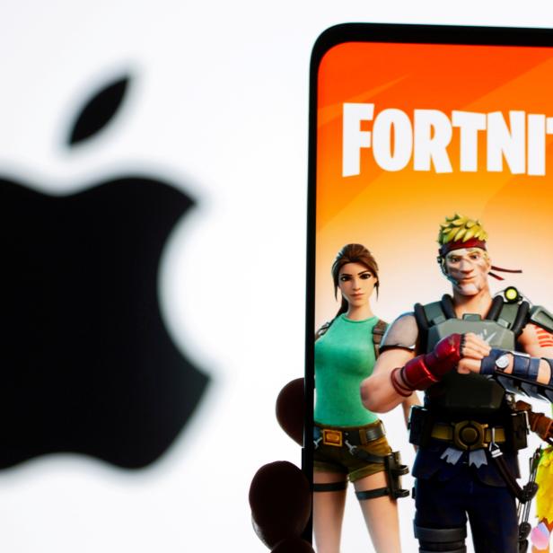 FILE PHOTO: Fortnite graphic and Apple logo displayed in illustration