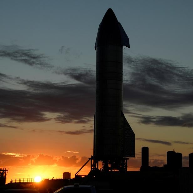 FILE PHOTO: SpaceX prepares their super heavy-lift Starship rocket  for a test launch at the company's facilities in Boca Chica, Texas