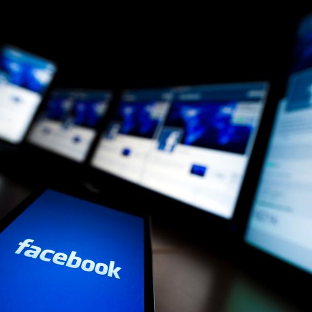 FILE PHOTO: The loading screen of the Facebook application on a mobile phone is seen in this photo illustration taken in Lavigny