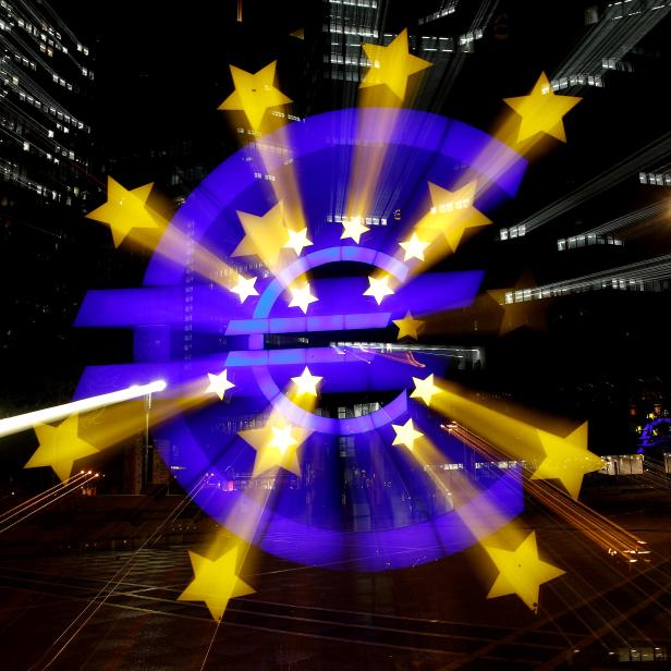 FILE PHOTO: The euro sign is photographed in front of the former headquarters of the European Central Bank in Frankfurt