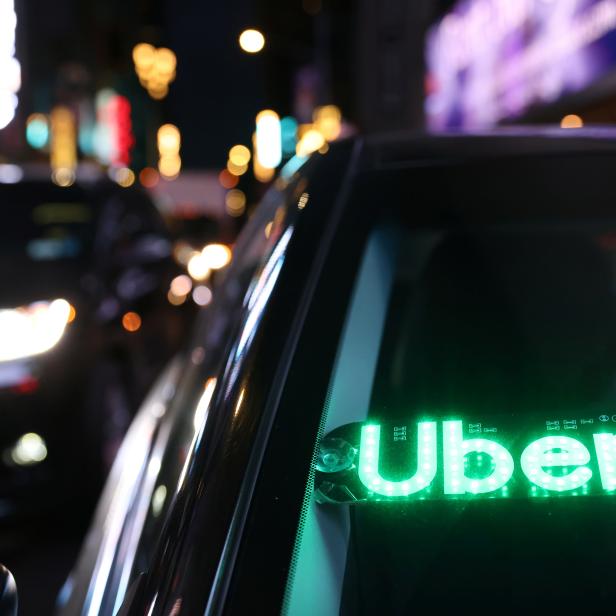 The logo for Uber Technologies is seen on a vehicle in Manhattan, New York City