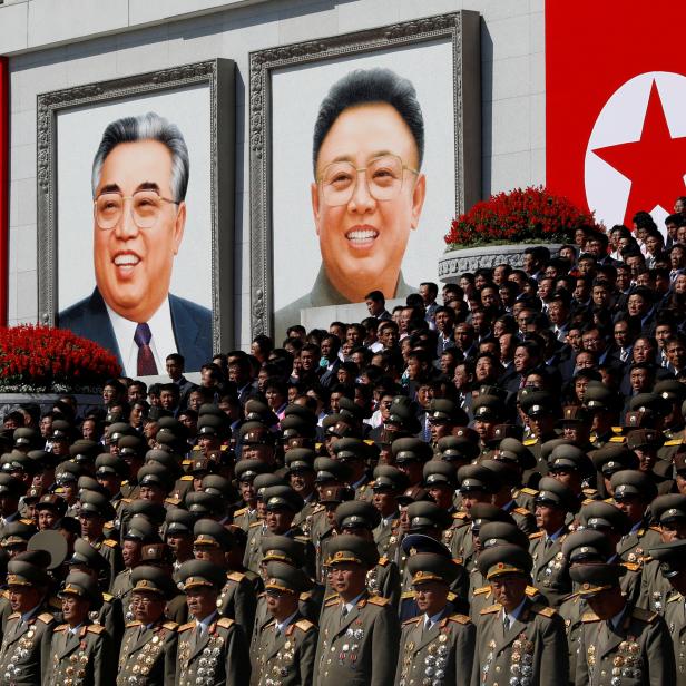 FILE PHOTO: North Korean senior military officials watch a parade