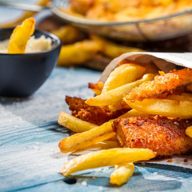 Closeup of Fish & Chips served in the newspaper