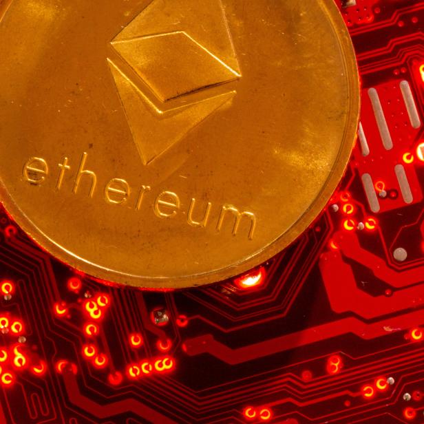 FILE PHOTO: Representation of cryptocurrency Ethereum is placed on PC motherboard in this illustration taken