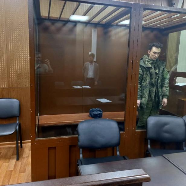 Artyom Zayets, detained on suspicion of the illegal circulation of means of payment, attends a court hearing in Moscow