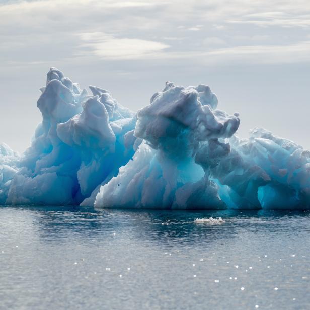 FILE PHOTO: An iceberg floats in a fjord near Tasiilaq, Greenland