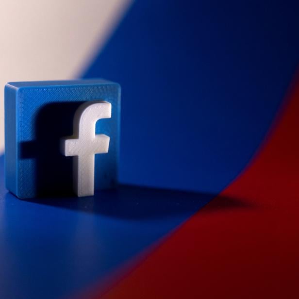 FILE PHOTO: Illustration shows Facebook logo and Russian flag