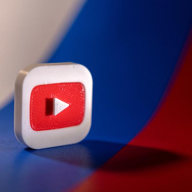 FILE PHOTO: Illustration shows Youtube logo and Russian flag