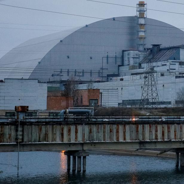 FILE PHOTO: A general view shows the New Safe Confinement structure over the old sarcophagus covering the damaged fourth reactor at the Chernobyl Nuclear Power Plant, in Chernobyl